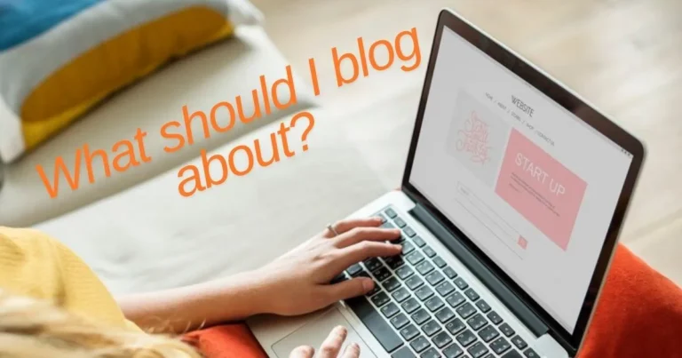 Girl holding laptop with caption What should I blog about