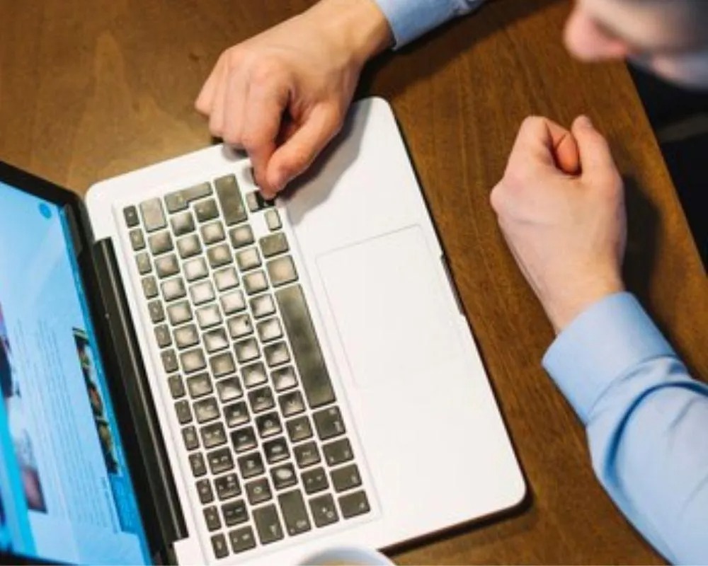 Man Checking laptop