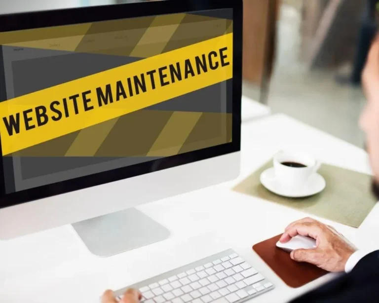 Man checking pc with website maintenance caption